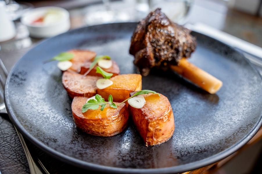 Alt text: A vibrant selection of regional potatoes from our bio-intensive garden, including the Patagonian (red skin, yellow flesh), Yaike (yellow skin, cream flesh), and Chiloé varieties, each offering distinctive colors, textures, and flavors, freshly harvested and highlighted in seasonal dishes at our restaurant—showcasing the diversity and innovation of sustainable Patagonian agriculture.